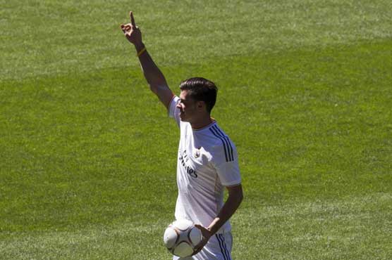 Bale presented at Madrid as Ozil exits for Arsenal