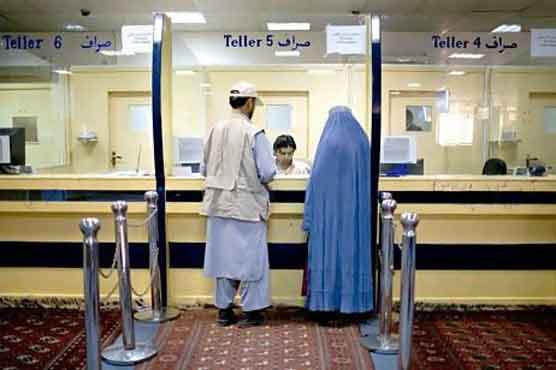 Afghan woman sought in $1.1m bank theft 