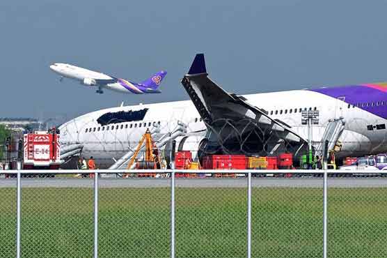 14 passengers hurt as Thai Airways skids off runway