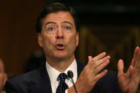 New FBI director defends surveillance program