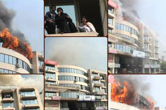 Lahore: Commercial plaza catches fire, dozens trapped