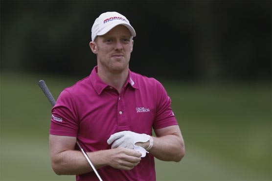 Golf: Horsey, Warren share lead in Cadiz gloom