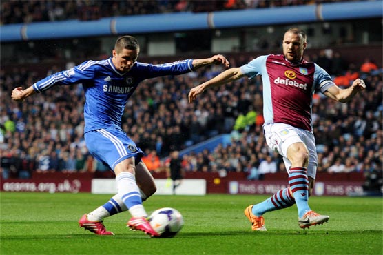 Football: Chelsea return to summit after easing past Stoke