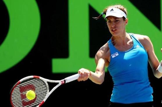 Tennis: Petkovic holds off Bouchard, reaches Charleston final   