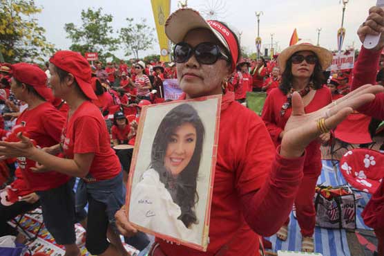 Thai Red Shirts vow to defend Yingluk