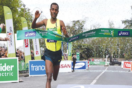 Athletics: Bekele wins debut marathon but misses world record
