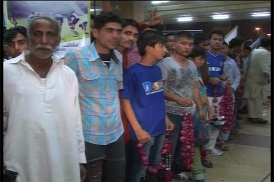 Street child footballers get heroes' welcome on return