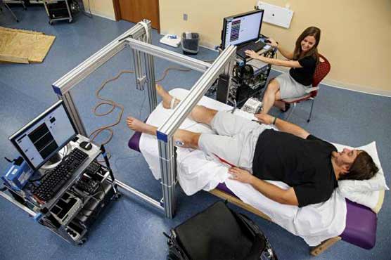 Paralyzed patients regain movement after spinal implant: study