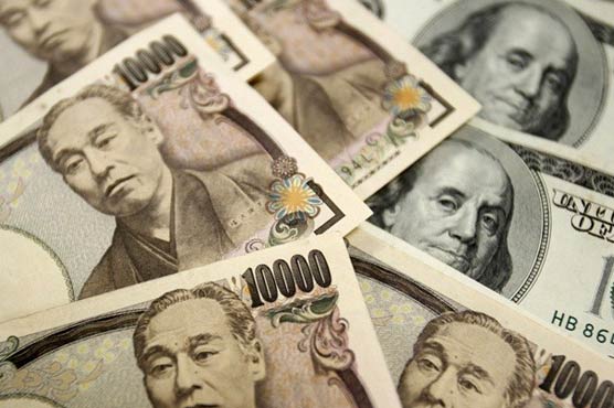 Dollar edges up against yen
