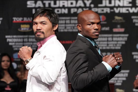 Boxing: Pacquiao, Bradley make weight for grudge match