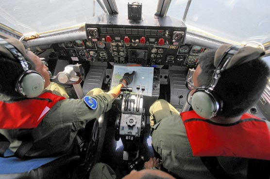 Malaysia says no mid-flight phone call from MH370 cockpit