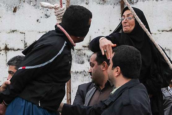 Iran mother spares life of son's killer with slap 