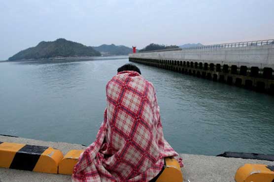 DNA test harsh step for families of missing S. Korea ferry victims