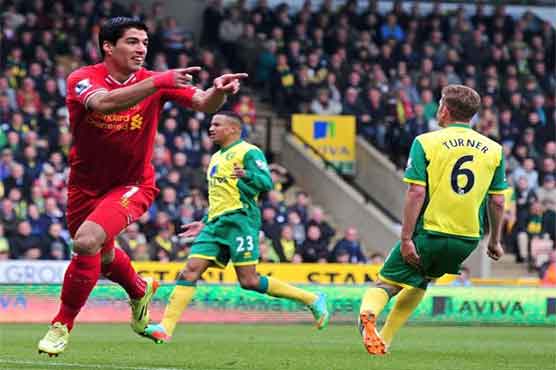 Football: Liverpool close on title, Everton sink United
