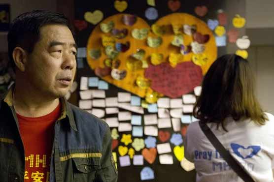 Malaysia vows MH370 transparency as families vent anger