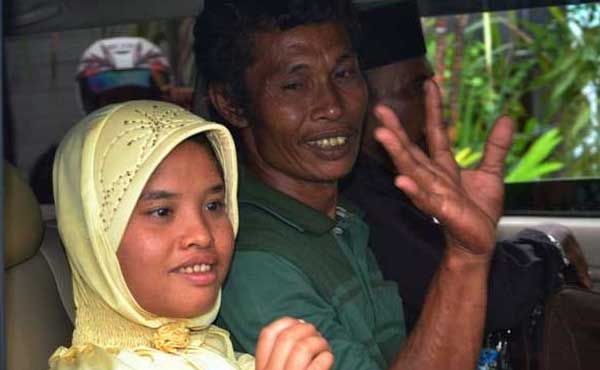 Indonesians hope to find son lost in tsunami after reunion with daughter