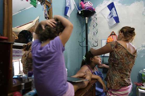 Honduran teens, mom navigate life after US reunion