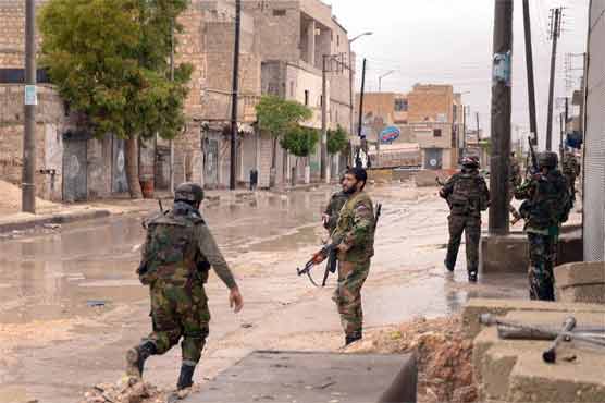 Syria troops retake key town outside Damascus 