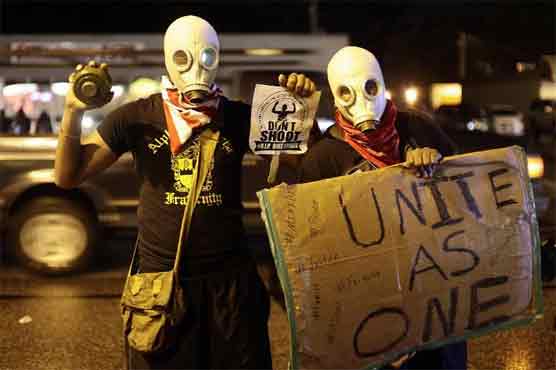 Fresh violence in riot-hit US town, new autopsy ordered