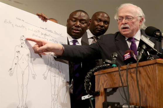 Ferguson teen shot six times, family pathologists say