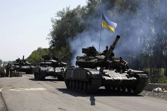 Ukrainian troops inch closer to rebel city Donetsk