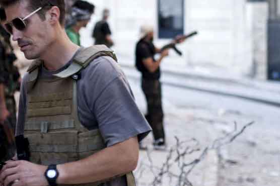 IS claims beheading of journalist, warns US on Iraq strikes