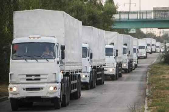 Tired of waiting, Russia pushes aid into Ukraine