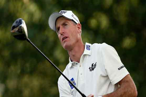 Golf: Roller-coaster Day, steady Furyk share PGA lead