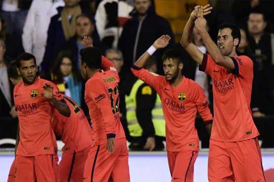 Football: Busquets snatches victory for Barca at Valencia