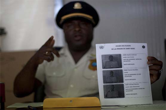 Haiti police say 34 inmates flee in prison break