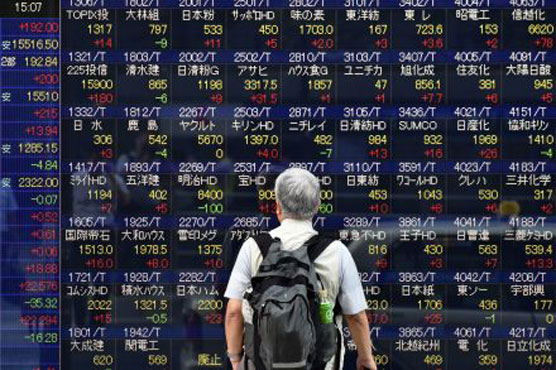 Tokyo stocks close up 0.94% to new seven-year high