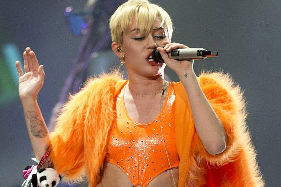 Miley Cyrus dazzles at Art Basel Miami Beach show