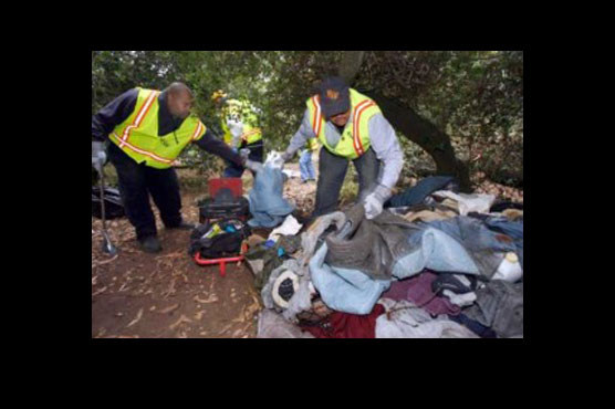Police breaking down huge California homeless camp
