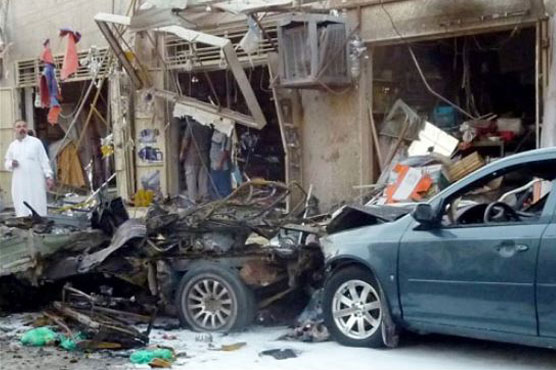 At least 15 killed in double car bombings in Baghdad