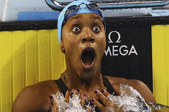 Swimming: Atkinson becomes first black woman to win world title