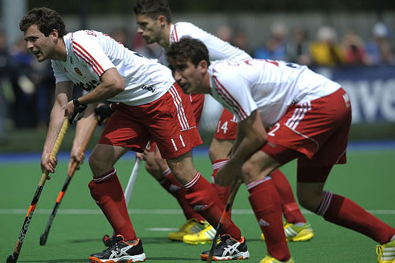 England tops Champions Trophy pool unbeaten