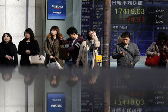 Asian shares mostly lower on weak China data