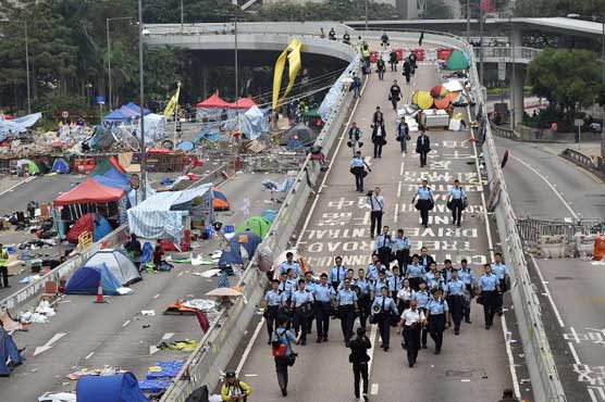 Hong Kong police order protesters out in rally shutdown 