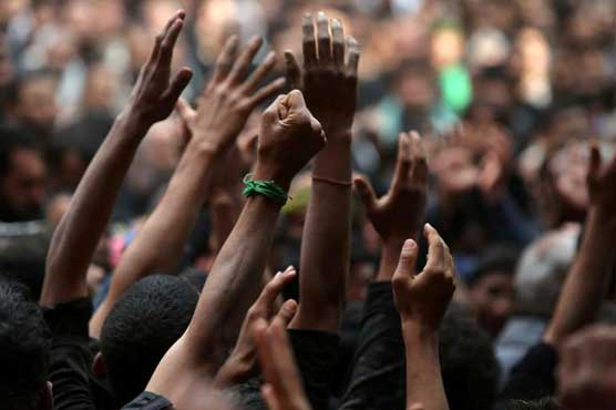 Devotion, defiance draw millions to Iraq pilgrimage 