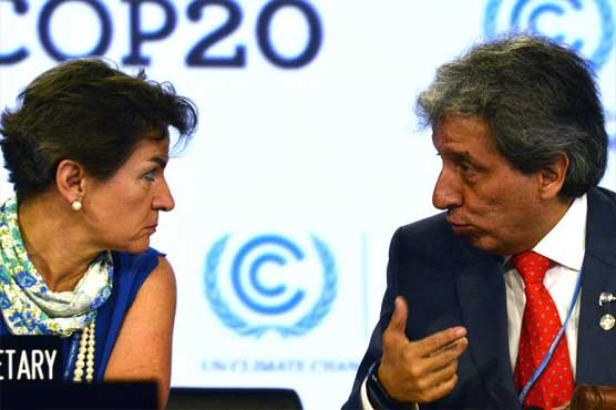 With rich-poor split, climate talks run into overtime 