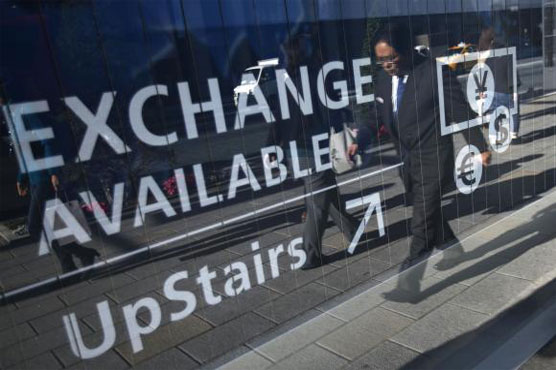  Yen edges up in choppy trade as risk aversion rises