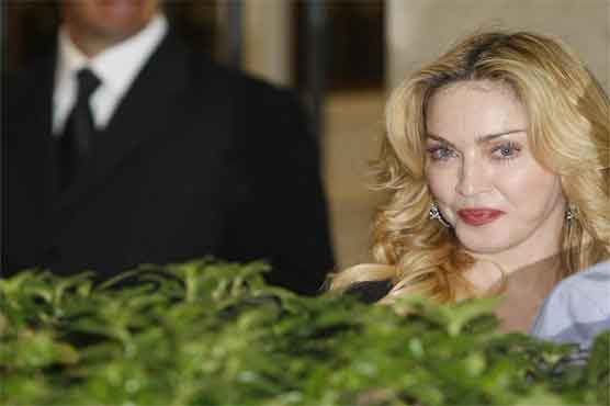 Madonna speaks of 'crazy times' after songs leaked