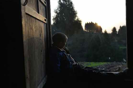 China promises medical care for HIV-positive boy: state media 