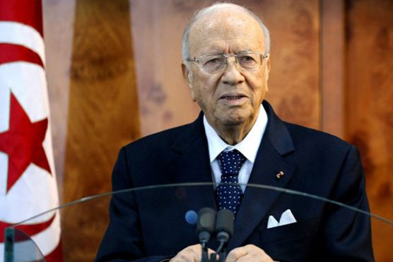 Newly elected leader says Tunisia has 'turned page'