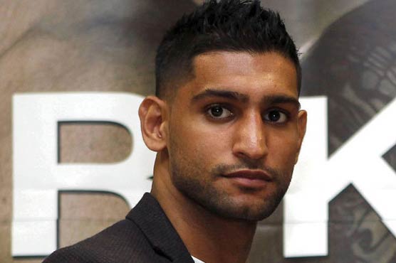 Boxer Amir Khan offers Pakistan help in fighting terror, rebuilding school