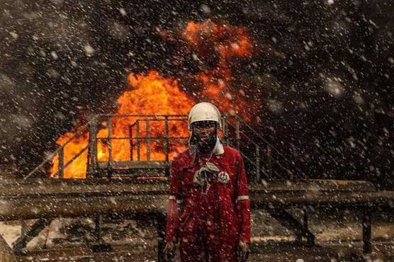 Oil tanks in Libya terminal ablaze after firefight