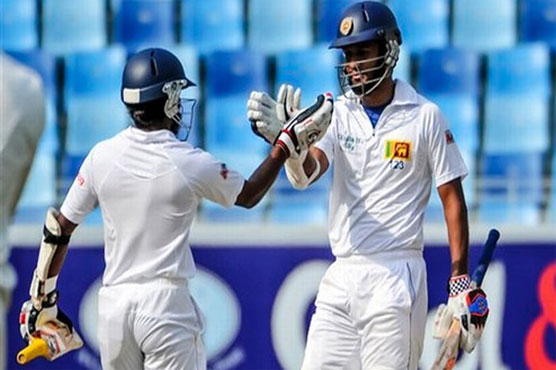 Karunaratne hits maiden ton as Sri Lanka fight on