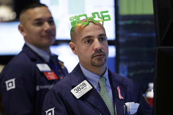 Stocks are mixed on last trading day of 2014