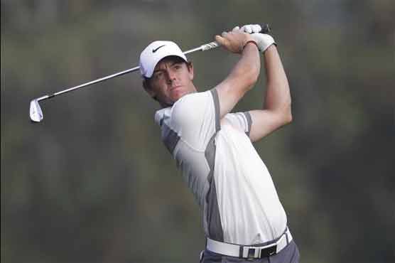 Golf: McIlroy holds on to lead in Dubai