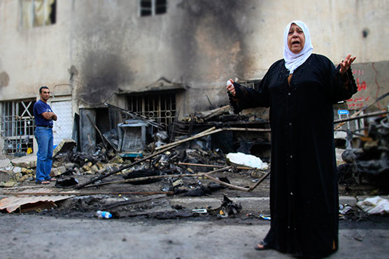 Baghdad bombs, one near foreign ministry, kill 19